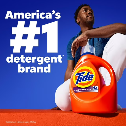 Person holding a large Tide detergent container with 'America's #1 Detergent Brand' text on a blue background